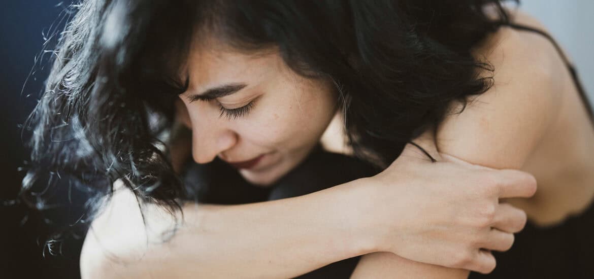 woman with nerve pain from bone spurs