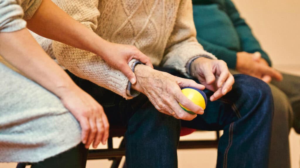 pain specialist inspecting nerve roots to relieve pain from carpal tunnel syndrome