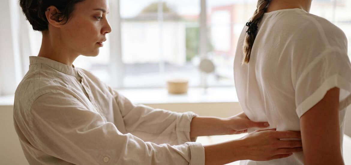 patient working with pain management specialists to relieve chronic pain